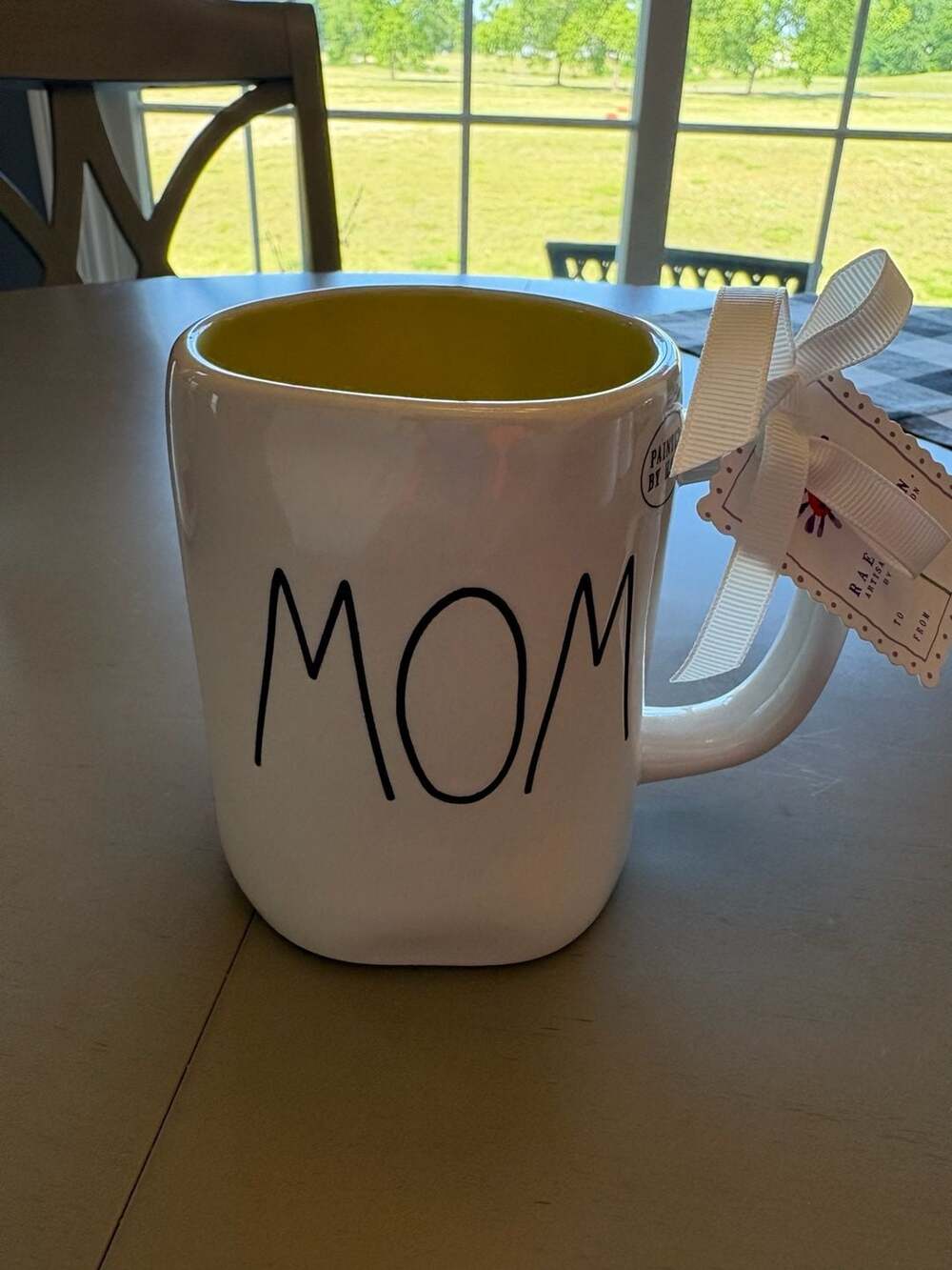Rae Dunn Artisan Collection MOM Mug with Yellow Interior and Flower Graphic